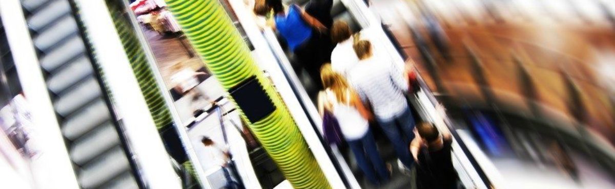 shoppers in modern mall image